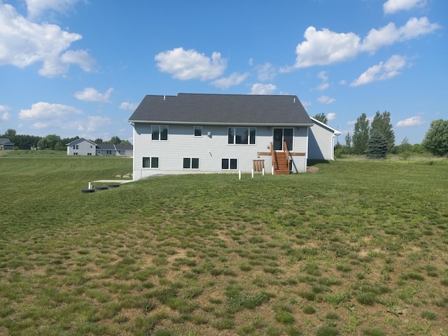 1267 146th Ave, New Richmond, WI 54017 - rear view of house featuring a yard