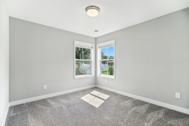 6450 Inspire Cir S, Cottage Grove, MN 55016 - carpeted spare room with baseboards