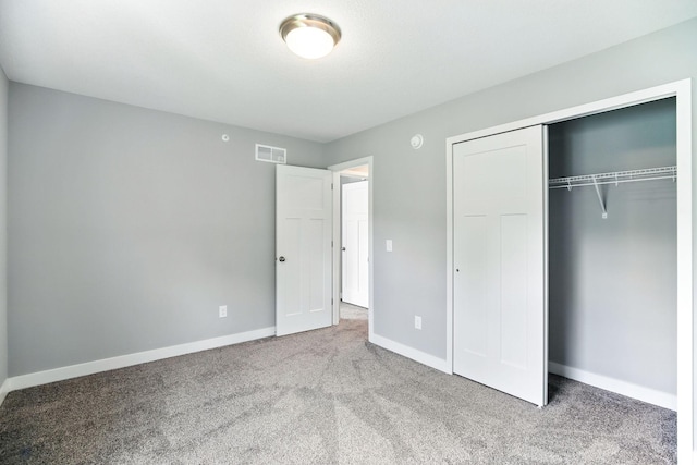 6450 Inspire Cir S, Cottage Grove, MN 55016 - unfurnished bedroom featuring carpet and a closet