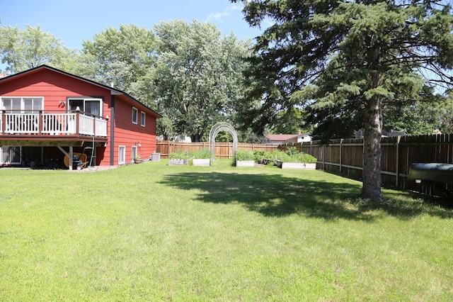 8301 Sumter Ave N, Brooklyn Park, MN 55445 - view of yard featuring a deck