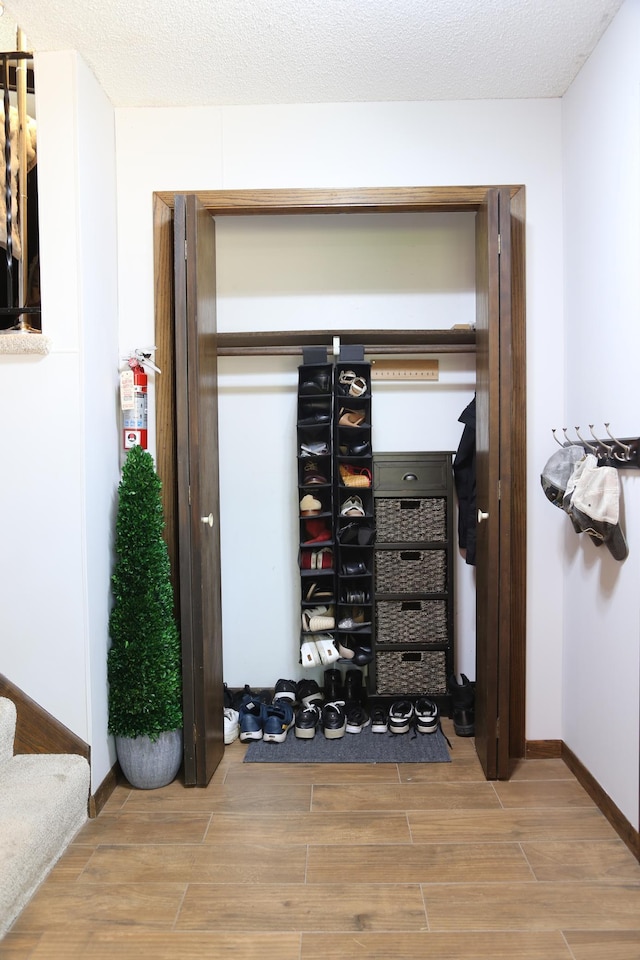 8301 Sumter Ave N, Brooklyn Park, MN 55445 - wine cellar with wood finish floors and baseboards