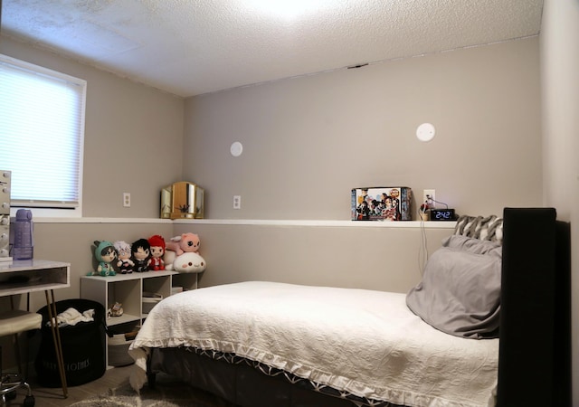 8301 Sumter Ave N, Brooklyn Park, MN 55445 - bedroom with a textured ceiling