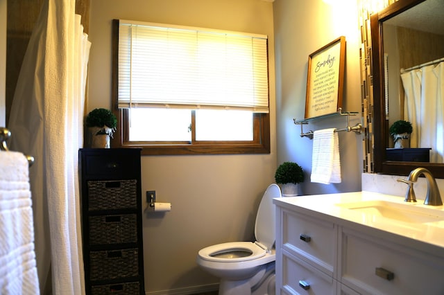 8301 Sumter Ave N, Brooklyn Park, MN 55445 - bathroom featuring toilet and vanity