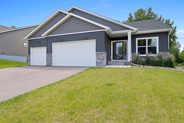 2065 Pleasant Dr, Prescott, WI 54021 - craftsman house with stone siding, an attached garage, a front yard, and concrete driveway