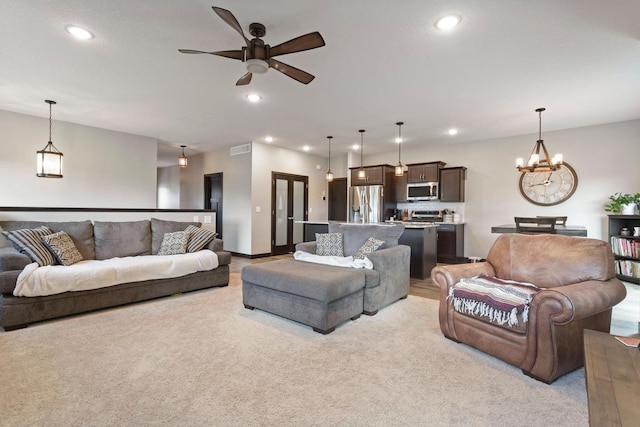 2065 Pleasant Dr, Prescott, WI 54021 - living area with a chandelier, ceiling fan, light colored carpet, and recessed lighting