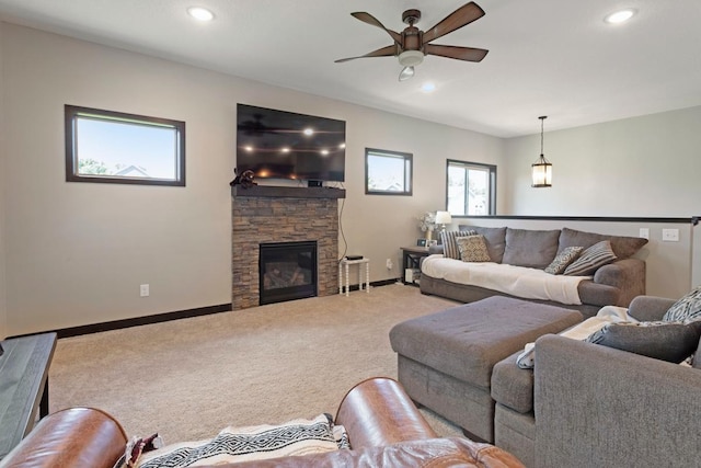 2065 Pleasant Dr, Prescott, WI 54021 - living area featuring carpet, ceiling fan, recessed lighting, and a stone fireplace
