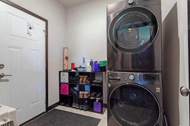 2065 Pleasant Dr, Prescott, WI 54021 - laundry room featuring stacked washer / drying machine and baseboards