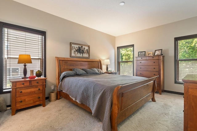 2065 Pleasant Dr, Prescott, WI 54021 - bedroom featuring light carpet and multiple windows