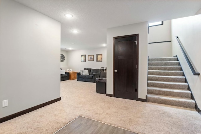 2065 Pleasant Dr, Prescott, WI 54021 - hallway with carpet floors, stairway, and recessed lighting