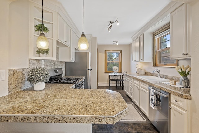 5321 Park Ave, Minneapolis, MN 55417 - kitchen with appliances with stainless steel finishes, decorative backsplash, healthy amount of natural light, and white cabinetry