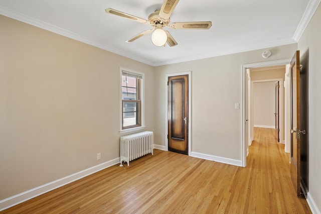 5321 Park Ave, Minneapolis, MN 55417 - unfurnished bedroom featuring radiator heating unit, light wood-style floors, crown molding, and a ceiling fan