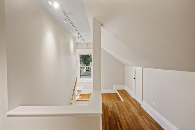 5321 Park Ave, Minneapolis, MN 55417 - additional living space featuring wood finished floors and vaulted ceiling