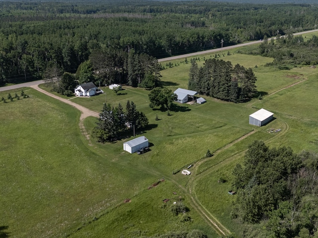 6770 County Road 65 NE, Deer River, MN 56636 - aerial view of property and surrounding area featuring a heavily wooded area and rural landscape