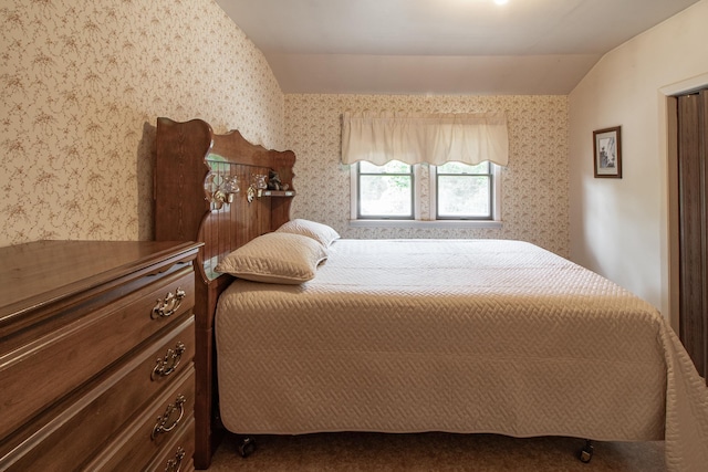 6770 County Road 65 NE, Deer River, MN 56636 - bedroom with wallpapered walls and vaulted ceiling
