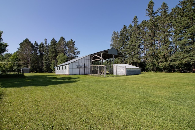 6770 County Road 65 NE, Deer River, MN 56636 - view of green lawn with an outbuilding