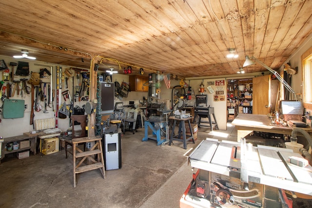 6770 County Road 65 NE, Deer River, MN 56636 - below grade area featuring a workshop area, wooden ceiling, and a ceiling fan