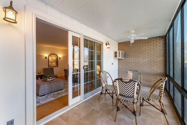 4380 Brookside Ct Unit 103, Edina, MN 55436 - sunroom with ceiling fan and a wall mounted air conditioner