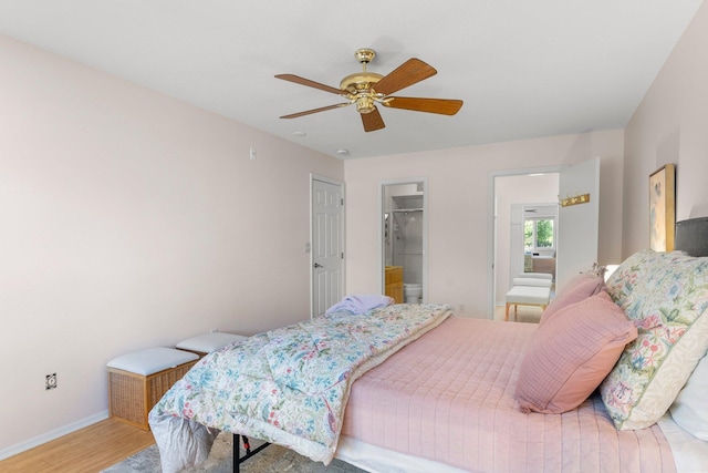 4380 Brookside Ct Unit 103, Edina, MN 55436 - bedroom with wood finished floors and ceiling fan