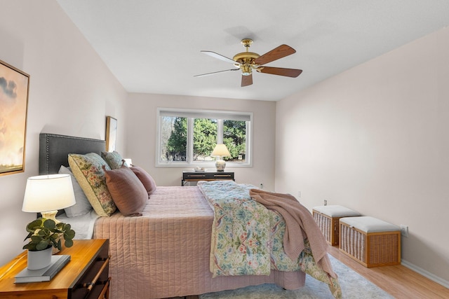 4380 Brookside Ct Unit 103, Edina, MN 55436 - bedroom with wood finished floors and ceiling fan