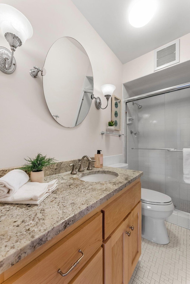 4380 Brookside Ct Unit 103, Edina, MN 55436 - full bathroom with vanity, a stall shower, and tile patterned floors