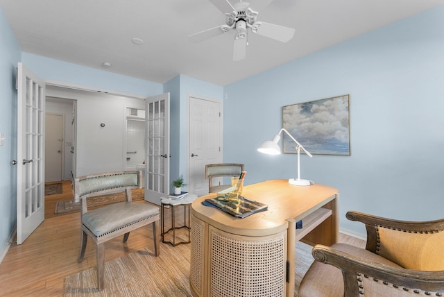 4380 Brookside Ct Unit 103, Edina, MN 55436 - office with french doors, light wood finished floors, and a ceiling fan