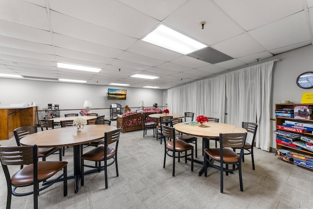 4380 Brookside Ct Unit 103, Edina, MN 55436 - dining room featuring light colored carpet and a paneled ceiling