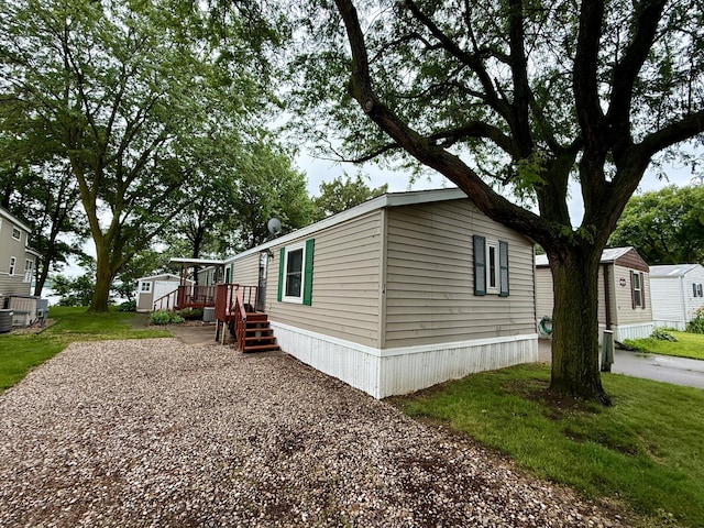14 Silvers Resort, Elysian, MN 56028 - view of property exterior featuring a yard