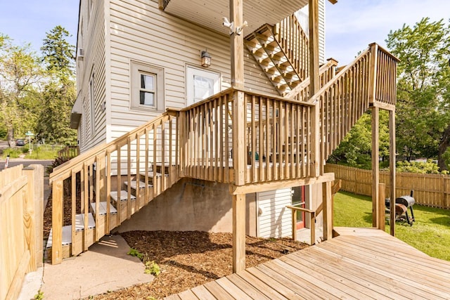 702 11th St, Duluth, MN 55805 - wooden terrace featuring a fenced backyard and stairs