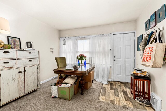 702 11th St, Duluth, MN 55805 - home office with wood finished floors and carpet