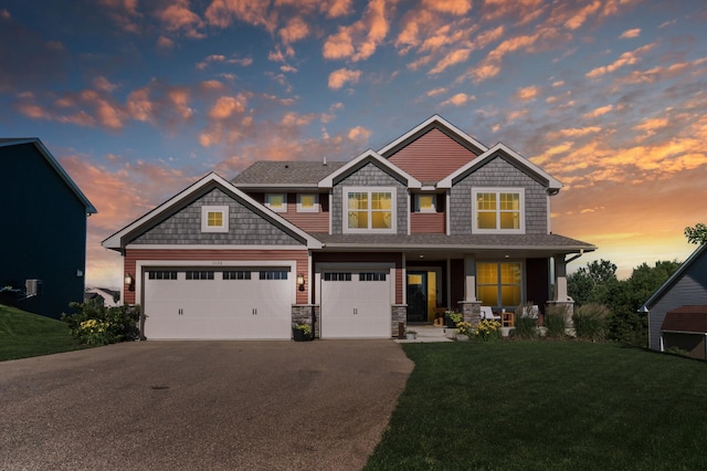 1126 Stonebridge Path, Jordan, MN 55352 - craftsman-style home with asphalt driveway, a front yard, covered porch, and an attached garage