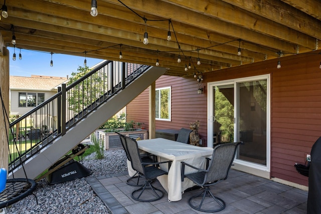 1126 Stonebridge Path, Jordan, MN 55352 - view of patio / terrace with stairs and outdoor dining area