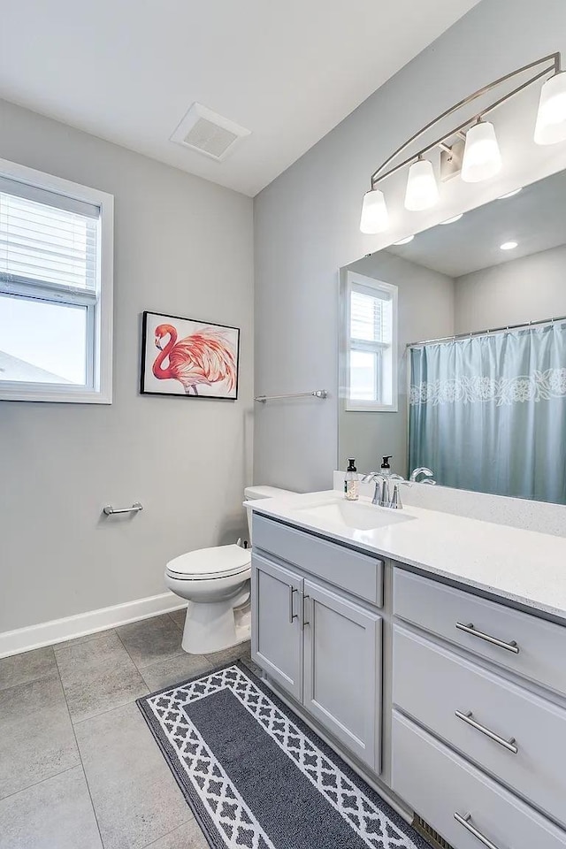 8251 62nd St, Bay South, Cottage Grove, MN 55016 - bathroom featuring vanity, tile patterned floors, and curtained shower