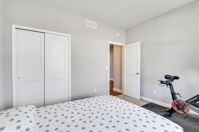 8251 62nd St, Bay South, Cottage Grove, MN 55016 - carpeted bedroom featuring baseboards and a closet
