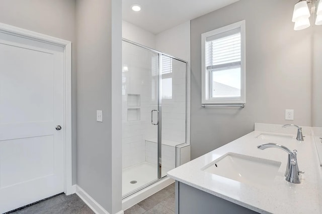 8251 62nd St, Bay South, Cottage Grove, MN 55016 - full bathroom featuring a stall shower, tile patterned floors, and double vanity