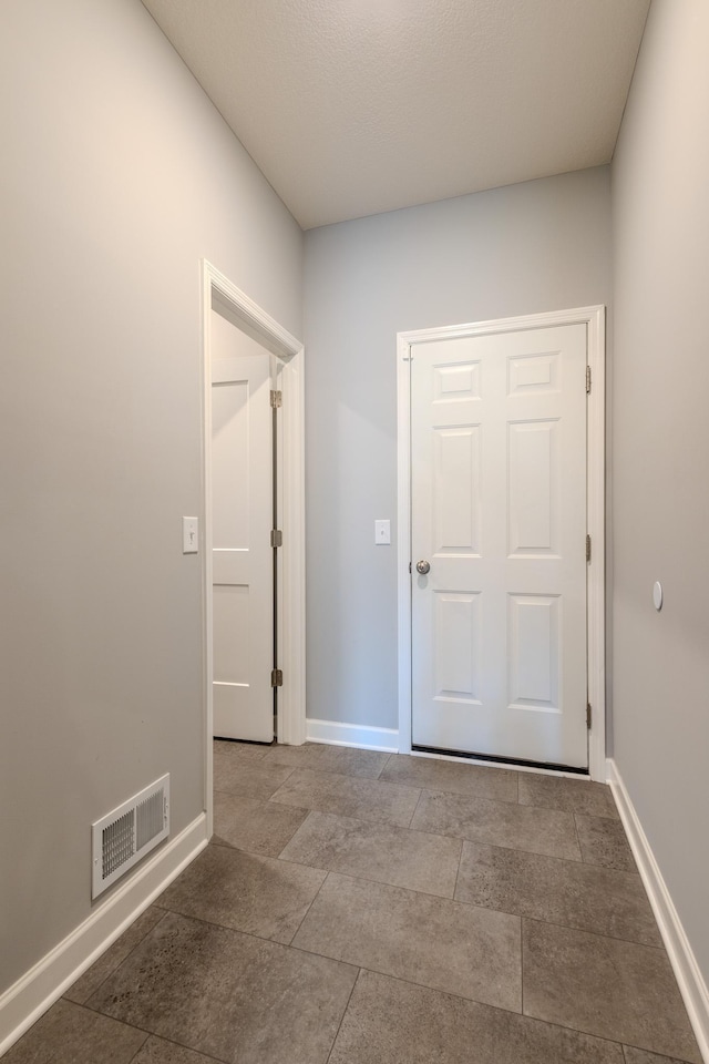 8251 62nd St, Bay South, Cottage Grove, MN 55016 - hallway featuring baseboards