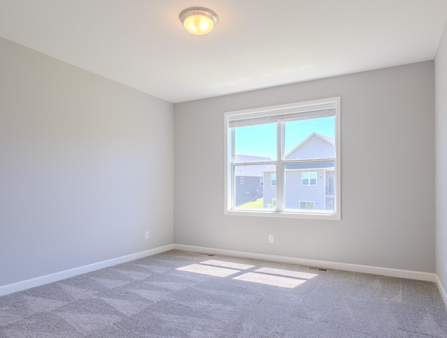 8251 62nd St, Bay South, Cottage Grove, MN 55016 - carpeted empty room featuring baseboards