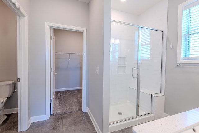 8251 62nd St, Bay South, Cottage Grove, MN 55016 - bathroom featuring a stall shower, a spacious closet, tile patterned flooring, and vanity