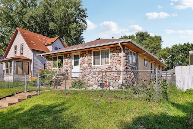 3825 2 1/2 St NE, Columbia Heights, MN 55421 - view of front of house with stone siding and a gate