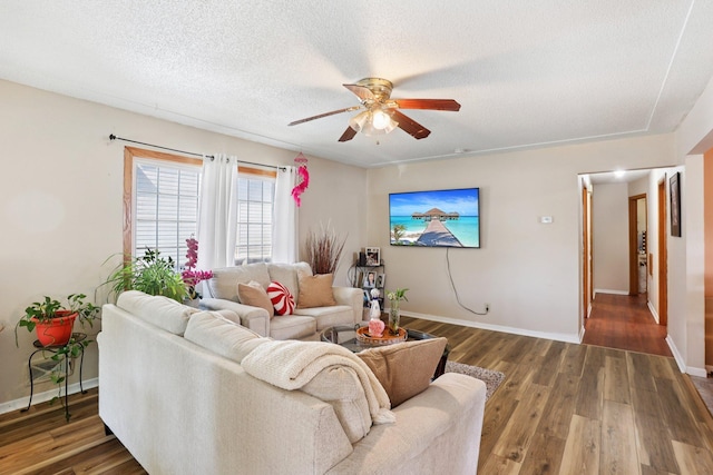 3825 2 1/2 St NE, Columbia Heights, MN 55421 - living room featuring ceiling fan, wood finished floors, and a textured ceiling