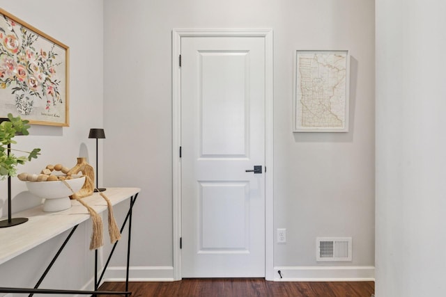 4297 Corn Silk Ln, Woodbury, MN 55129 - corridor with baseboards and dark wood-style flooring