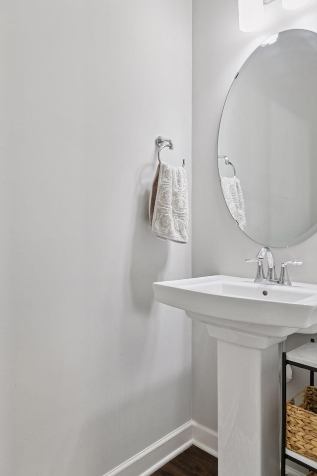 4297 Corn Silk Ln, Woodbury, MN 55129 - bathroom with baseboards and wood finished floors