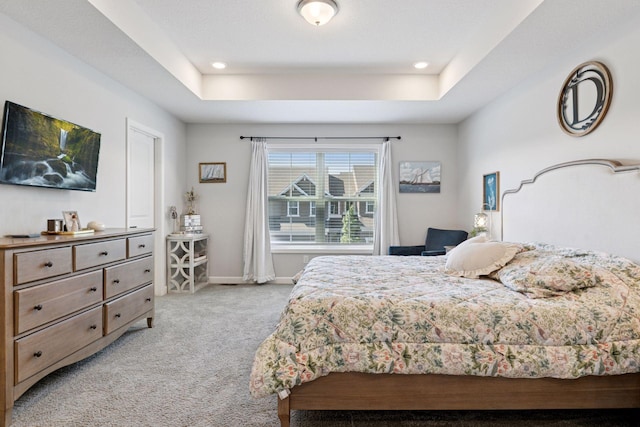 4297 Corn Silk Ln, Woodbury, MN 55129 - bedroom with light carpet, a tray ceiling, and recessed lighting