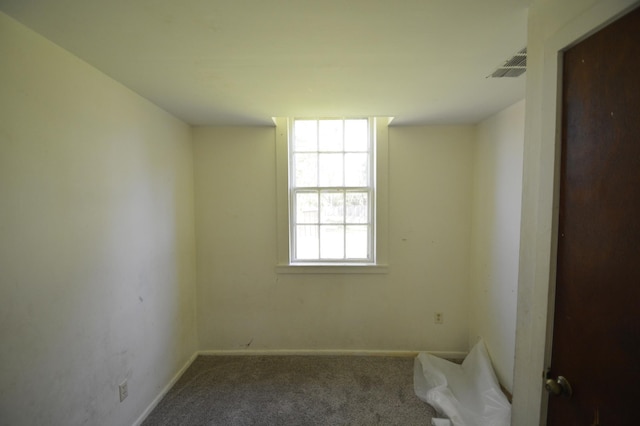 506 3rd Ave NW, Dodge Center, MN 55927 - carpeted spare room with baseboards