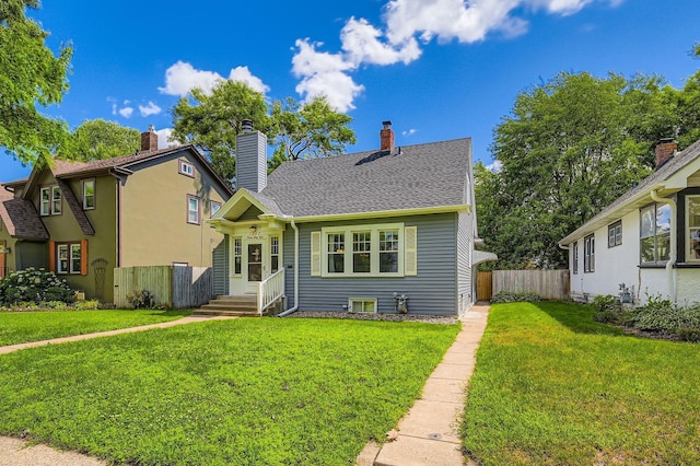 1268 Stanford Ave, Saint Paul, MN 55105 - view of front of property featuring a chimney and roof with shingles