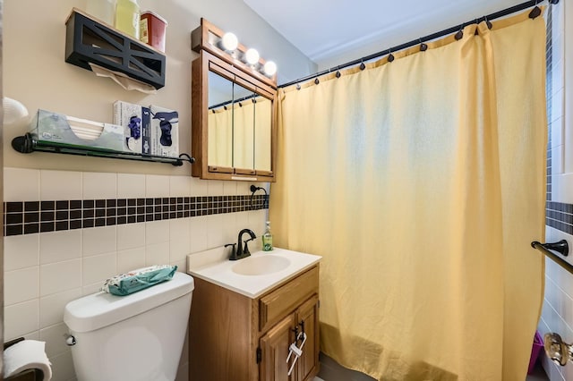 1268 Stanford Ave, Saint Paul, MN 55105 - full bathroom featuring tile walls, vanity, a shower with shower curtain, and decorative backsplash