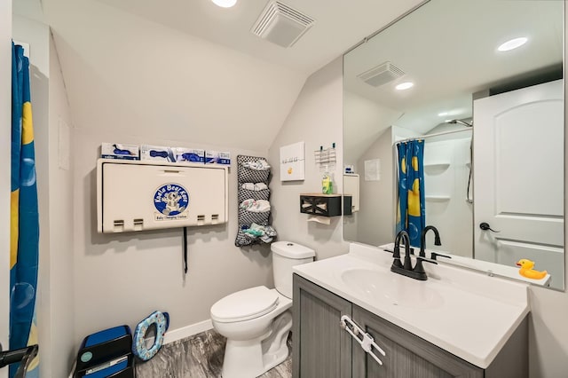 1268 Stanford Ave, Saint Paul, MN 55105 - full bathroom featuring lofted ceiling, vanity, curtained shower, wood finished floors, and recessed lighting