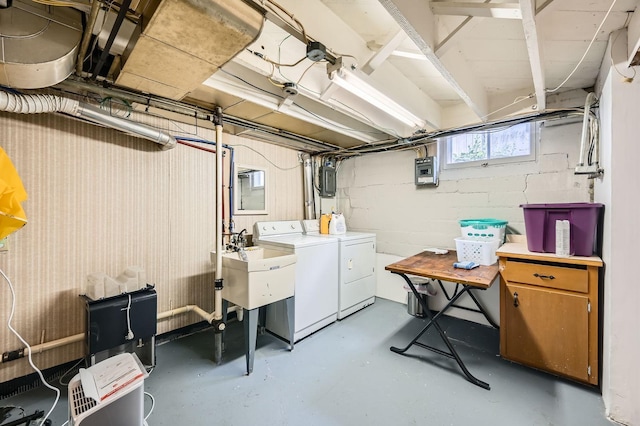 1268 Stanford Ave, Saint Paul, MN 55105 - below grade area featuring separate washer and dryer and a sink