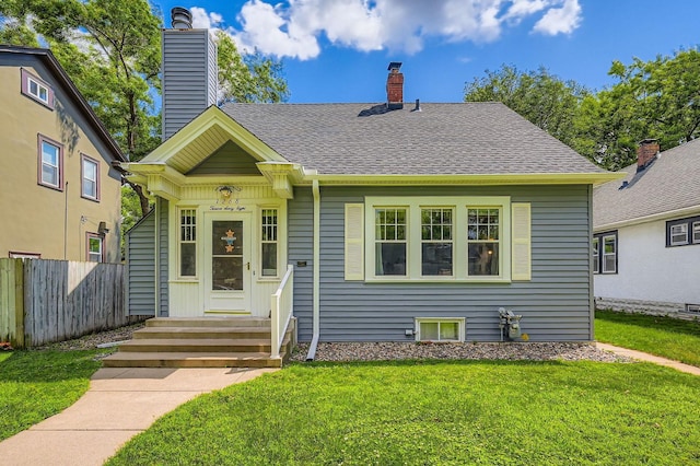 1268 Stanford Ave, Saint Paul, MN 55105 - bungalow featuring entry steps, a chimney, and a shingled roof