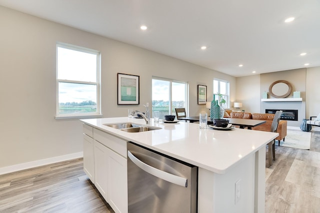 12403 81st St NE, Otsego, MN 55330 - kitchen featuring dishwasher, open floor plan, a center island with sink, light wood-type flooring, and recessed lighting