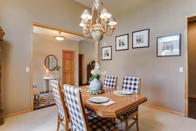 2064 141st Ln NE, Ham Lake, MN 55304 - dining space with a chandelier and light carpet